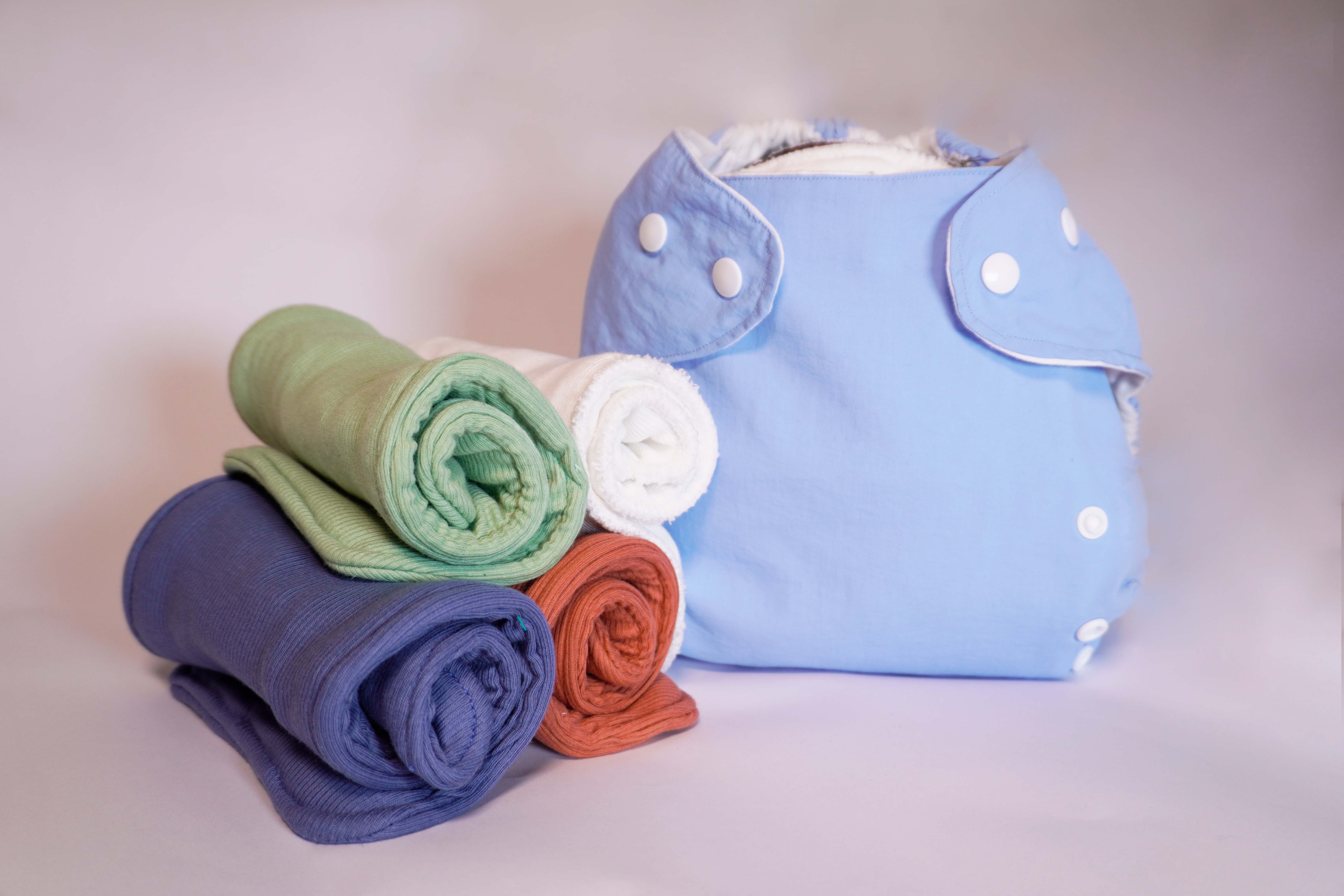 Reusable diapers and period pads